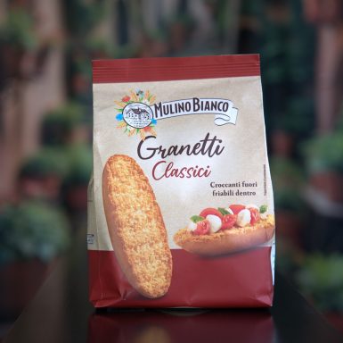 Verpackung von Granetti Classic mit einem Keks und frischen Früchten.